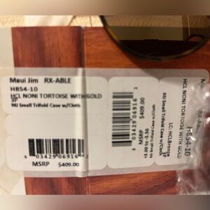 Maui Jim sunglasses. NWT. Perfect condition. Paid $400.